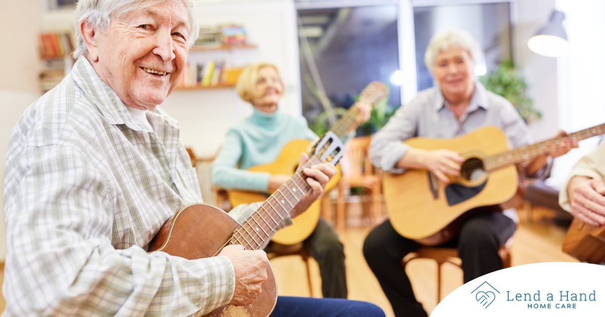 A group of seniors enjoy playing instruments together showing the impact of music for older adults.