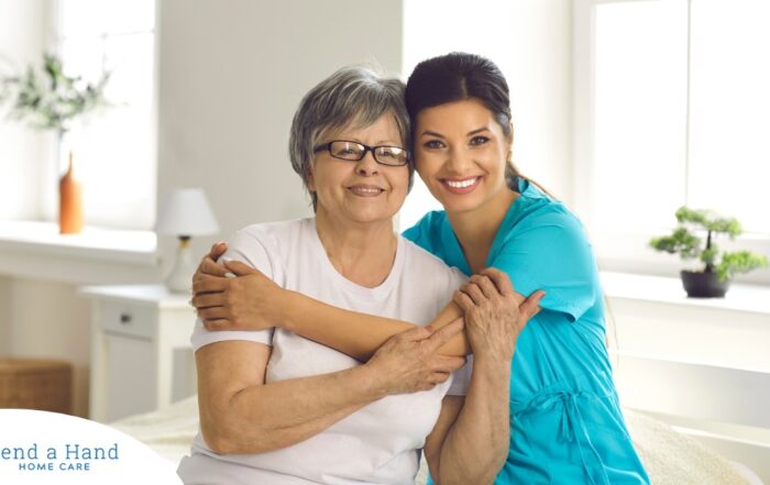 A caregiver hugs an older client, representing how a trustworthy caregiver cares for clients.